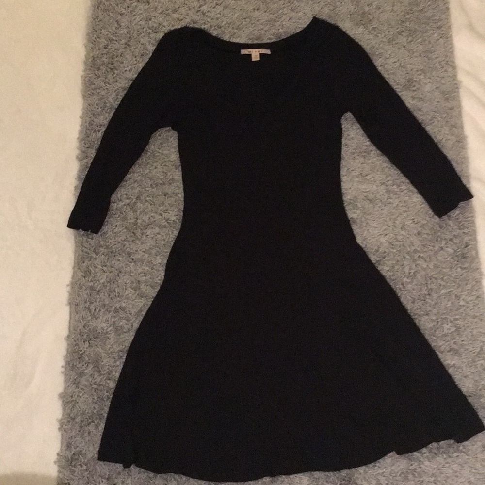 Quarter length sleeve black dress